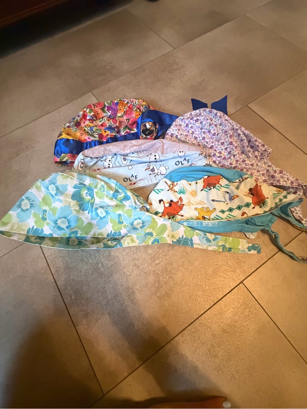 Assorted Scrub Caps, used great condition- floral & Disney prints